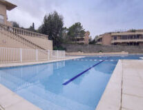 swimming pool, sky, outdoor, ground, swimming, pool, water, board, building